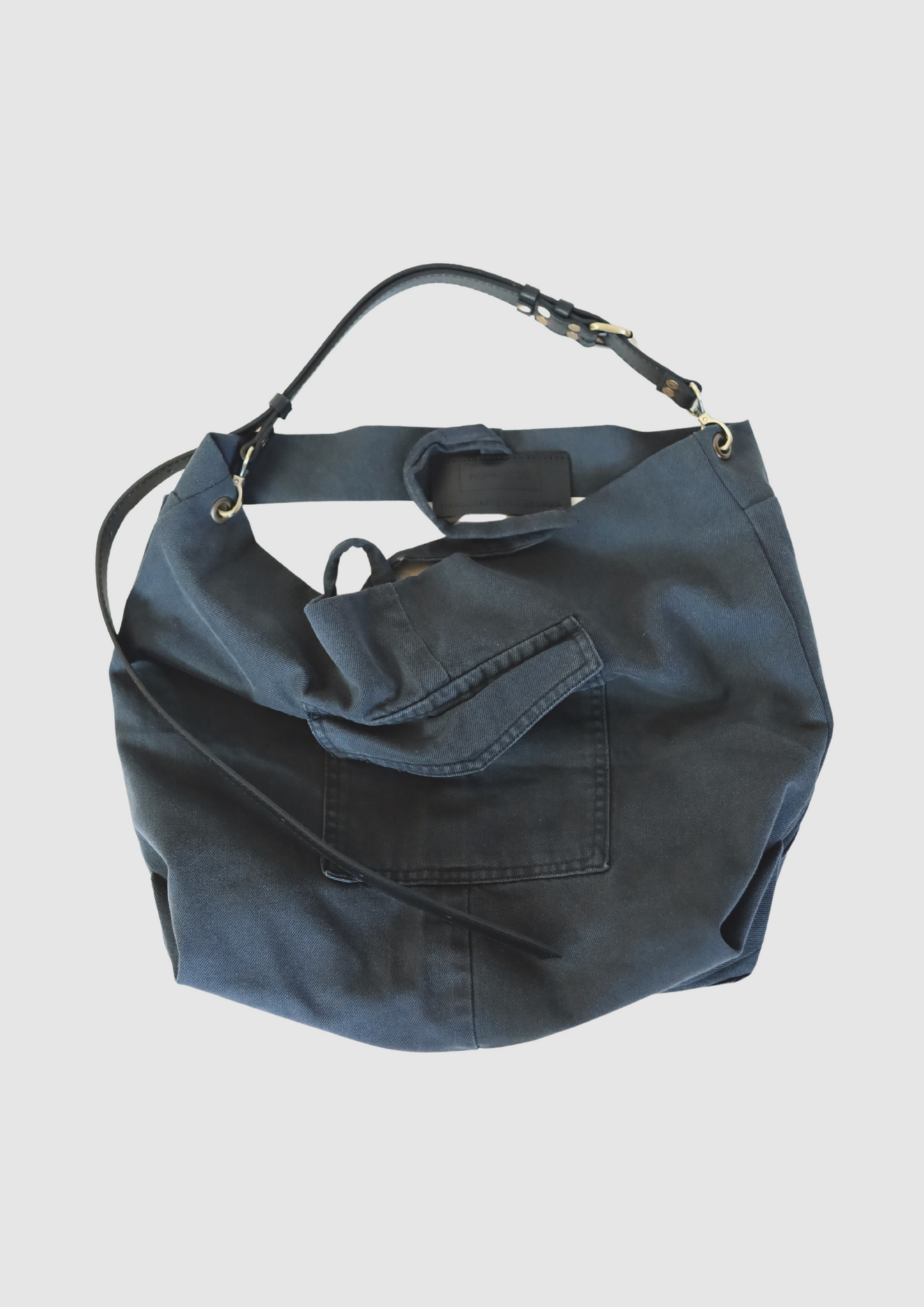Handmade upcycled bag crafted from repurposed materials – eco-friendly, sustainable tote for everyday use. Zero-waste fashion, recycled fabric shoulder bag, ethical handmade accessory, unique and stylish reusable shopper.